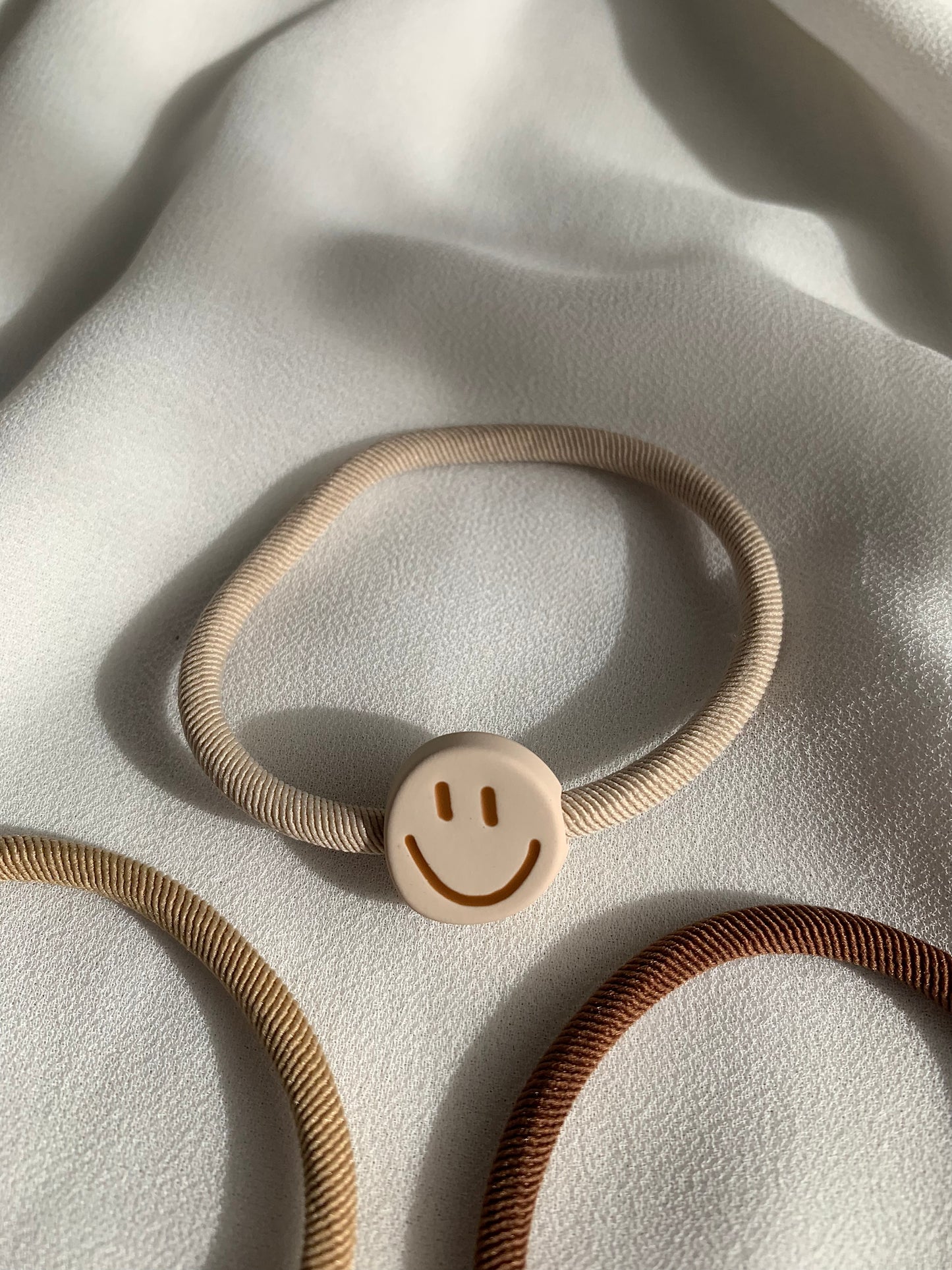 Haargummi Smiley Perle