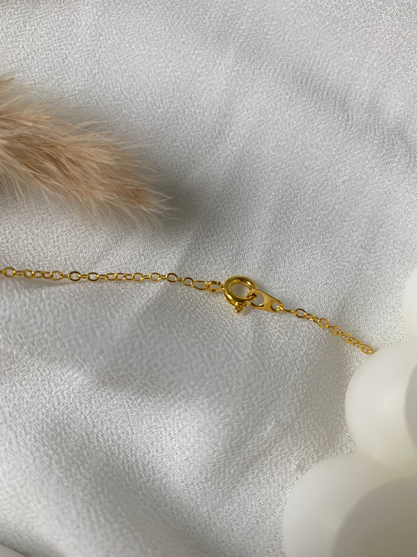 Goldene Muschelkette