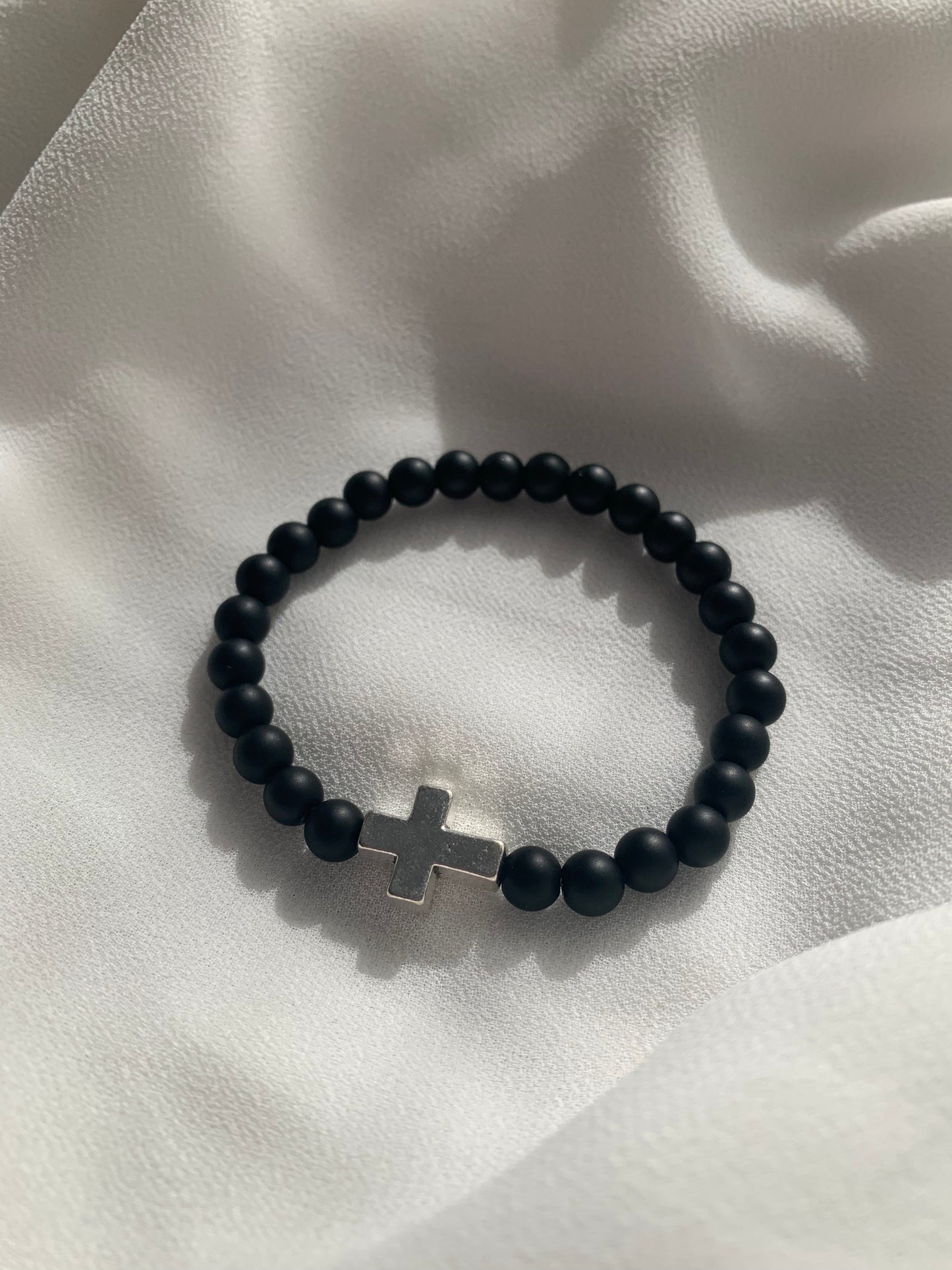 Perlenarmband, Kreuz