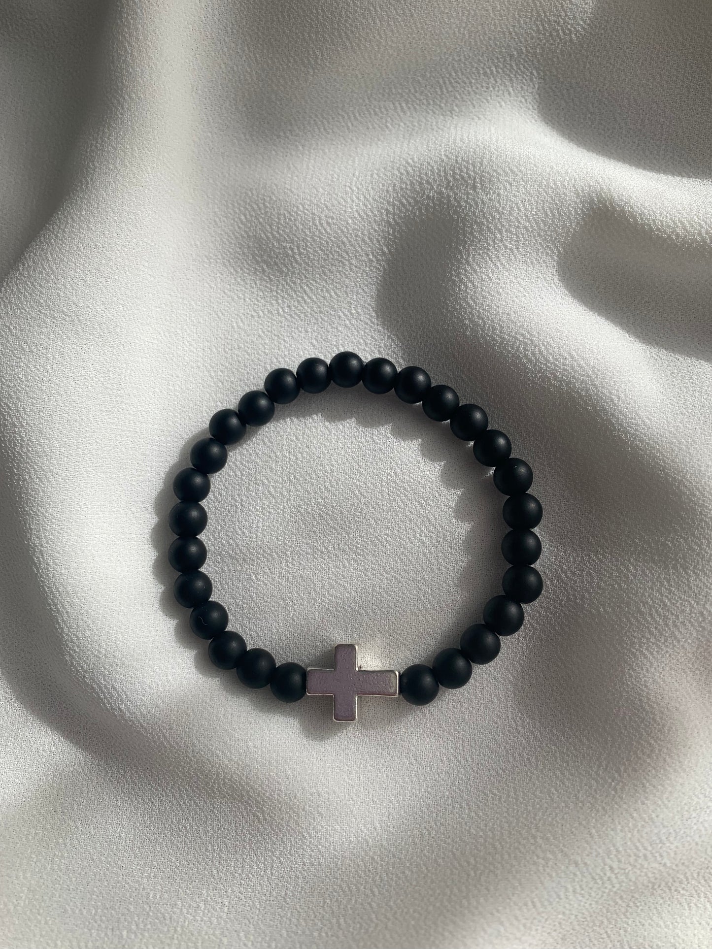 Perlenarmband, Kreuz